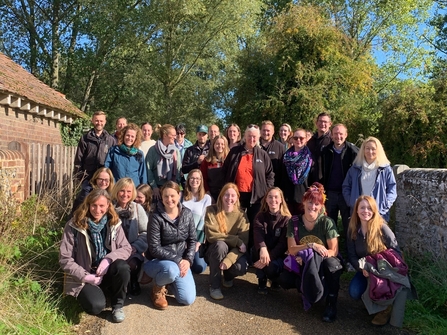 Herts and Middlesex Wildlife Trust Staff stand together for a photo while out on a team walk