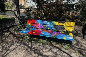 Bench painted in colourful flowers