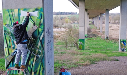 Mark Tanti working on Mural at King's Mead