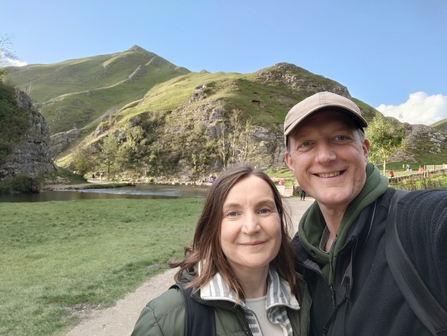 Big wild walker Steve is taking a selfie with a mountain behind him