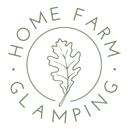 Logo for Home Farm Glamping showing an oak lead