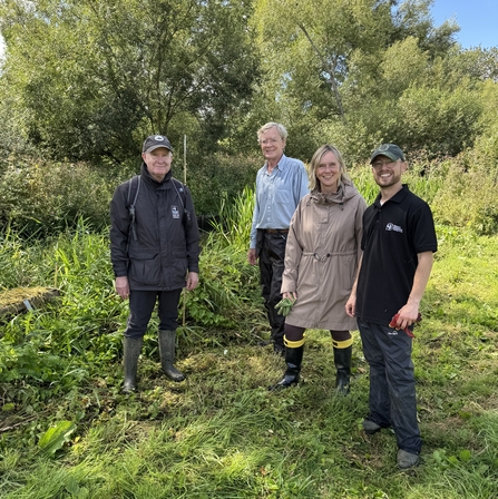 Conservation manager Tim Hill, River Champion Patrick McNeill, Media and PR Officer Debbie Bigg and Water Vole Officer Josh Kalms standing next to the lush banks of the Upper Lea