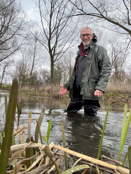Peter White in river